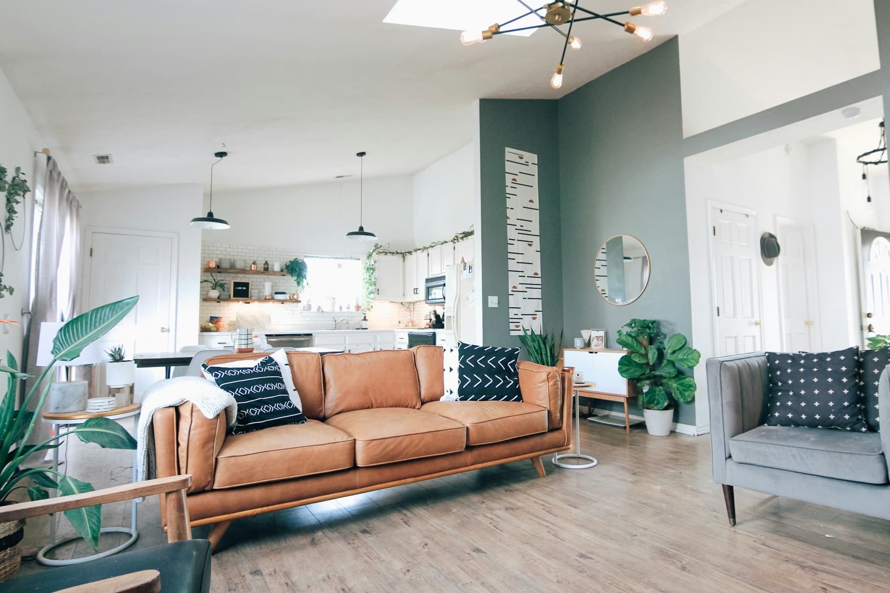 Modern interior suite with large windows and natural light